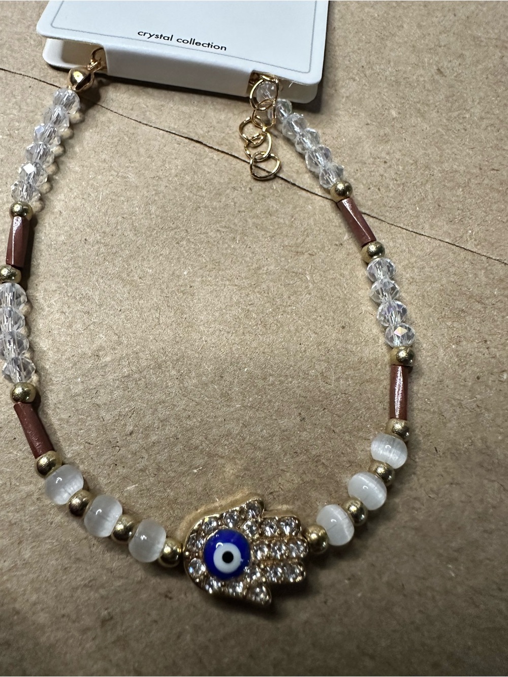 Crystal Collection Gold Hamsa Beaded bracelet with Blue Eye